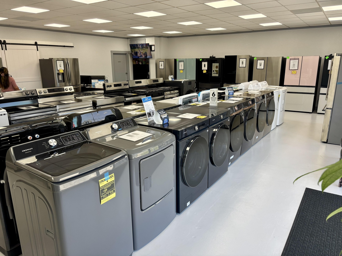 Gulf Coast Outlet showroom floor with new and open box appliances in Milton FL